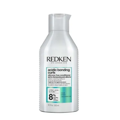 Възстановяващ балсам за третирани и увредени къдрави коси Redken Acidic Bonding Curls Conditioner 300ml